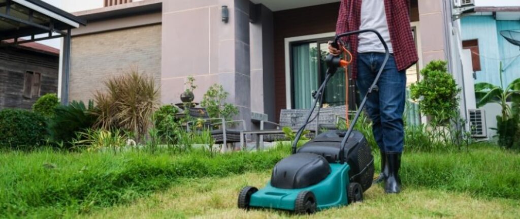 A person mowing the grass